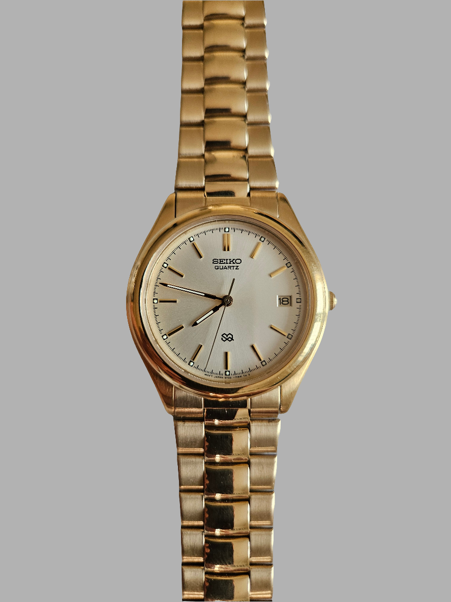 Seiko S2 Quartz Mens gold tone watch.