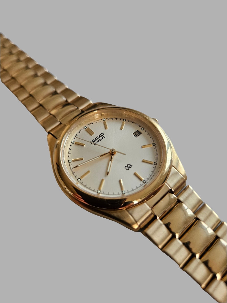 Seiko S2 Quartz Mens gold tone watch.