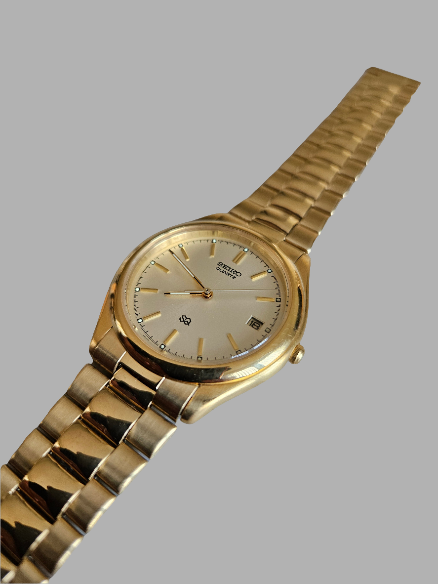 Seiko S2 Quartz Mens gold tone watch.