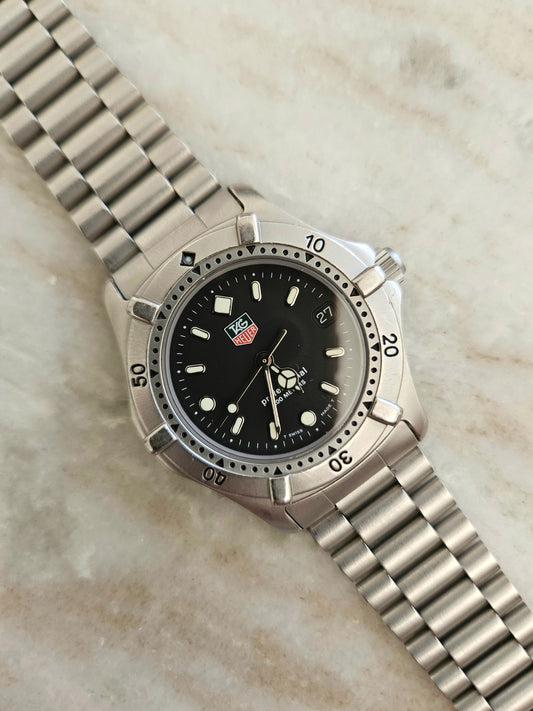 Tag Heuer 2000 WE1210-R Quartz Midsize Watch.